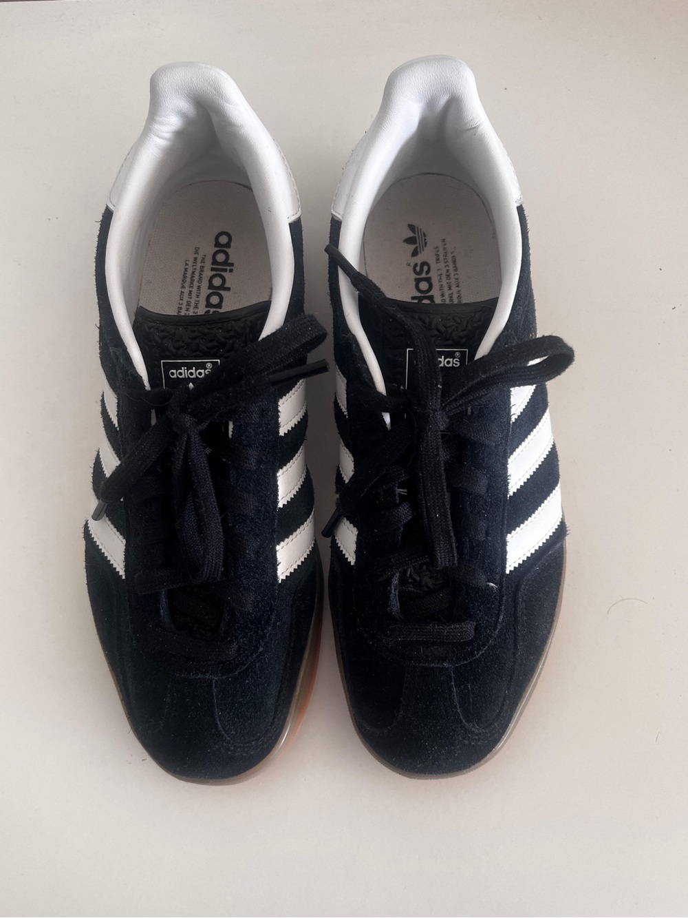 Adidas women’s Black and White Suede Sneakers